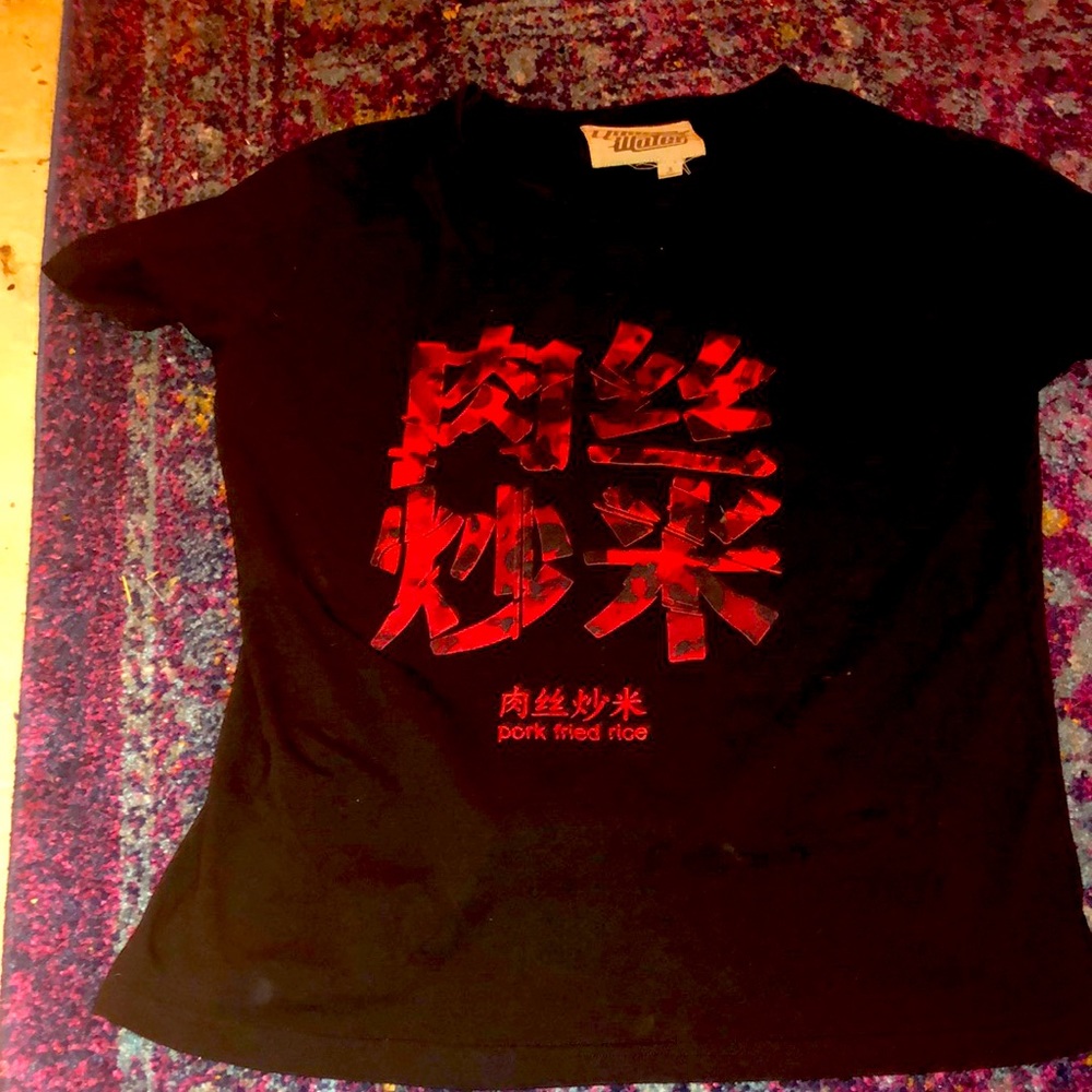 Brand is quarter water. Size small. Color is black and red
